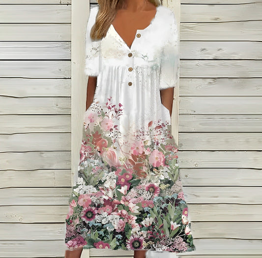 Robe midi à poches boutonnées avec fleurs roses et faux boutons